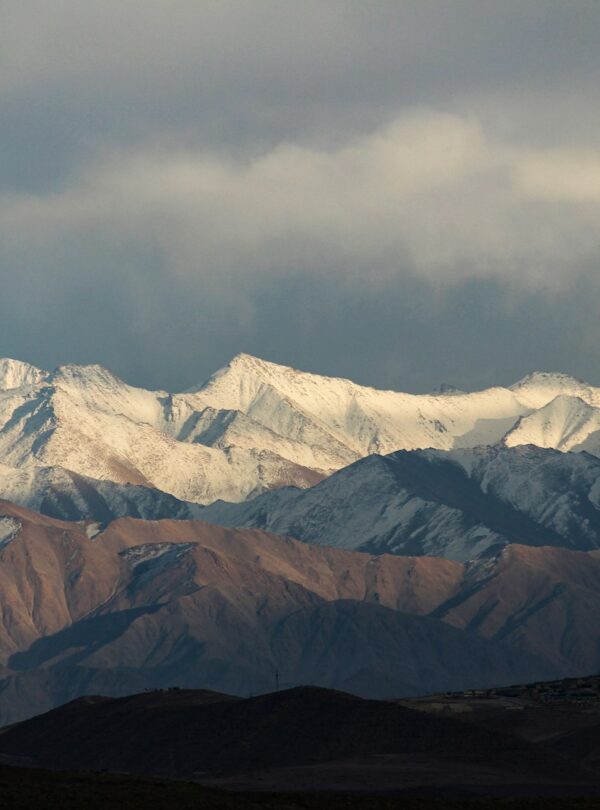 snow covered mountain during daytime