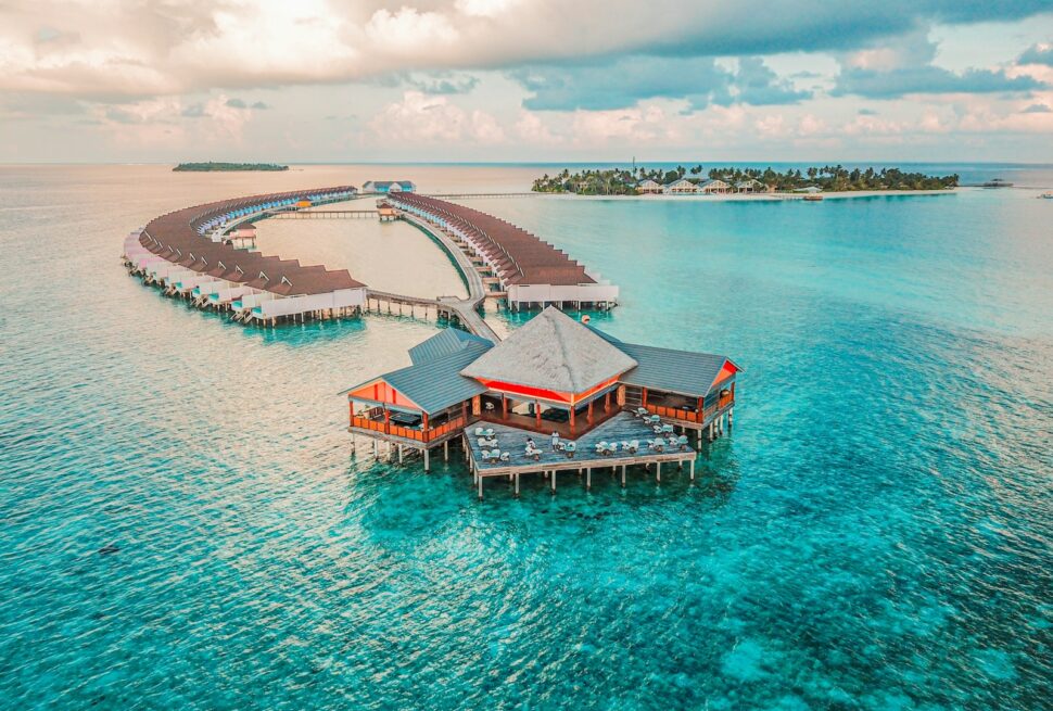 aerial photography of resort rooms and island