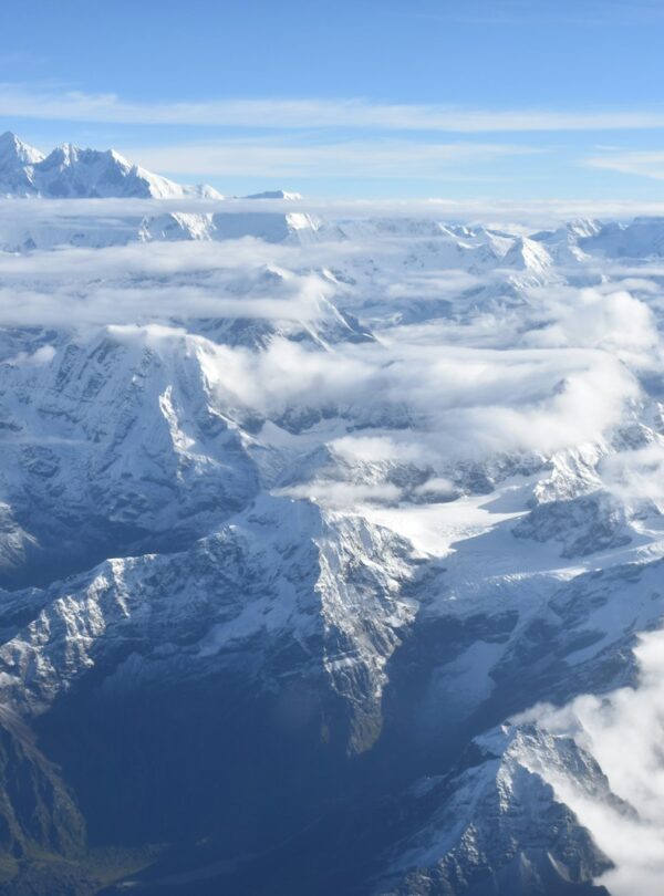white fog on mountain during daytime